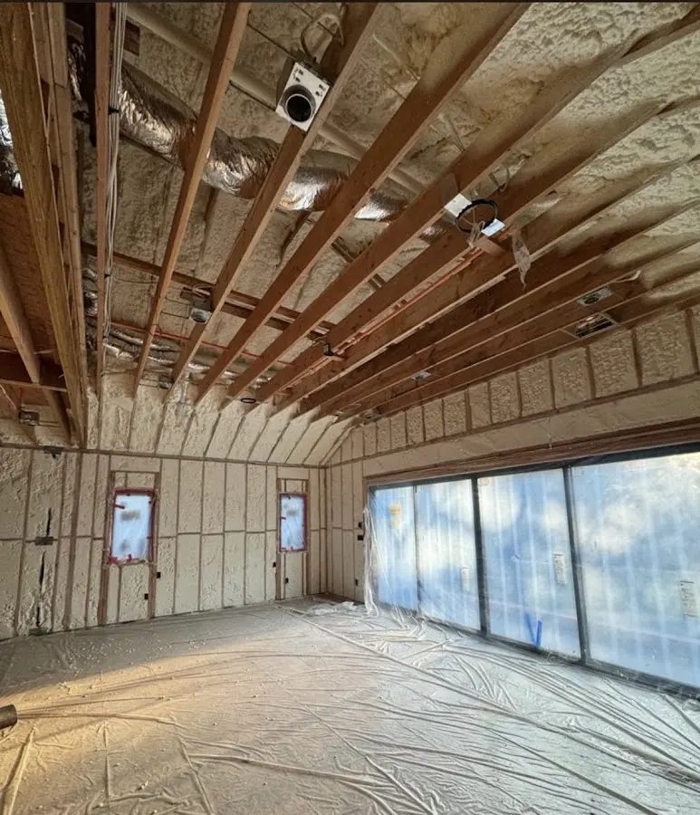 Interior walls and ceiling insulated with spray foam during new construction in Washington